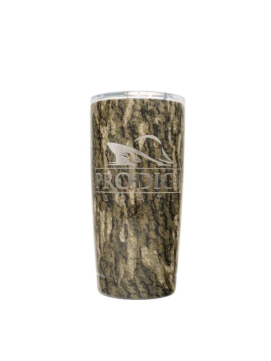 A 20 oz insulated stainless steel tumbler with a Mossy Oak - Bottomland camouflage pattern and a clear plastic lid, featuring the Prodigy logo and the text 'PRODIGY BOATS' on the front.