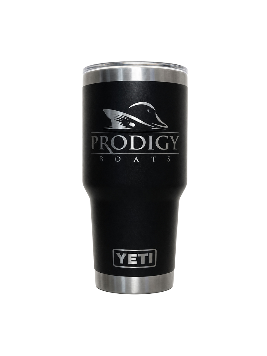 A black Yeti tumbler with a silver stainless steel rim and base, featuring the 'PRODIGY BOATS' logo and a duck silhouette on the front.