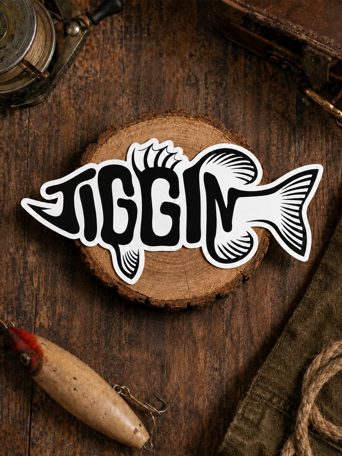 Jiggin Fish vinyl decal applied on a surface, Prodigy Boats fishing sticker